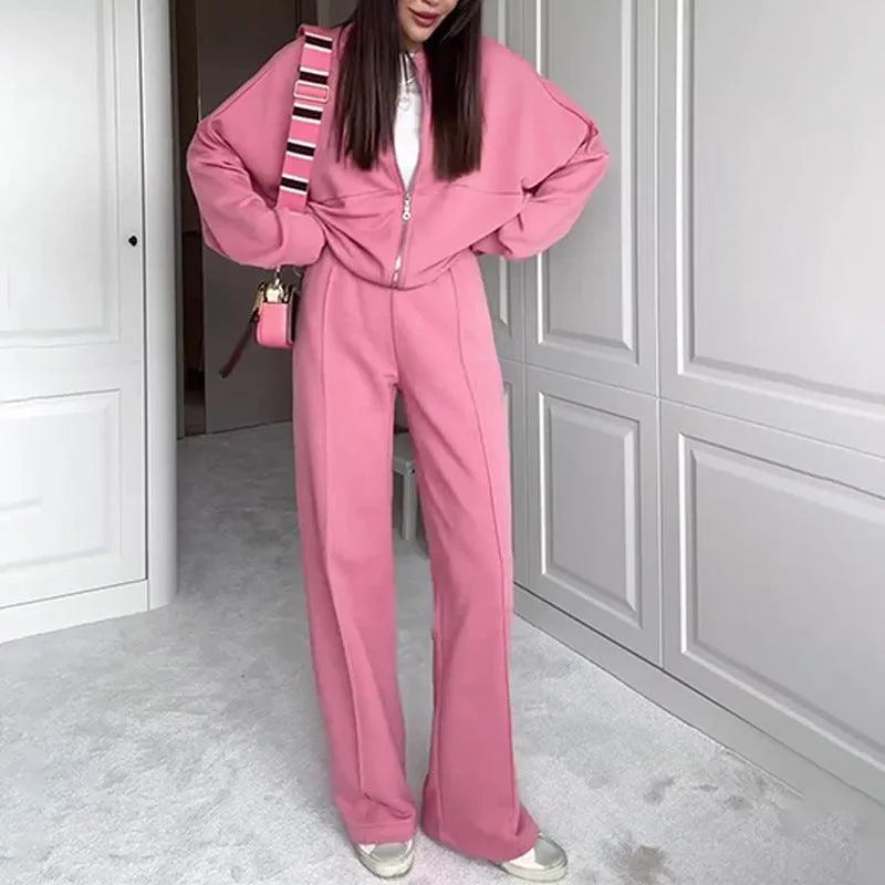 Levoire | Complété avec un pantalon décontracté et un pull zippé uni Rosa