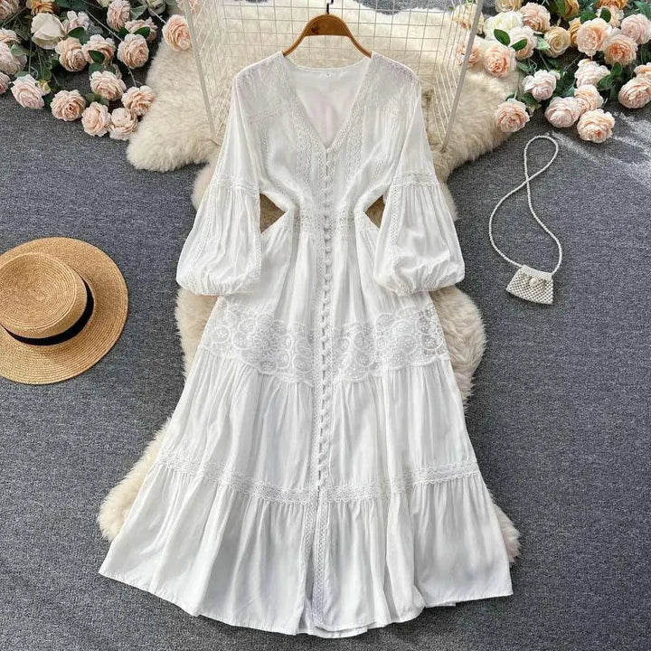 Levoire | Robe avec manches bouffantes et taille délicate Blanc