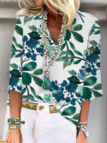 Levoire | Élégant top à motifs floraux et à manches mi-longues