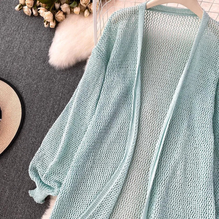 Levoire | Gilet en maille avec des manches bouffantes
