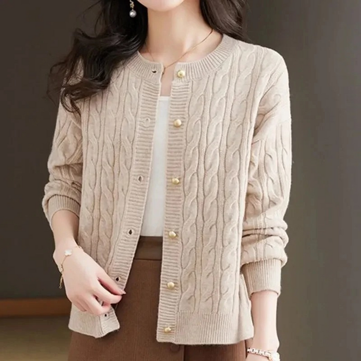 Levoire | Gilet pour femmes avec motif en cable, col rond et boutons dorés Beige