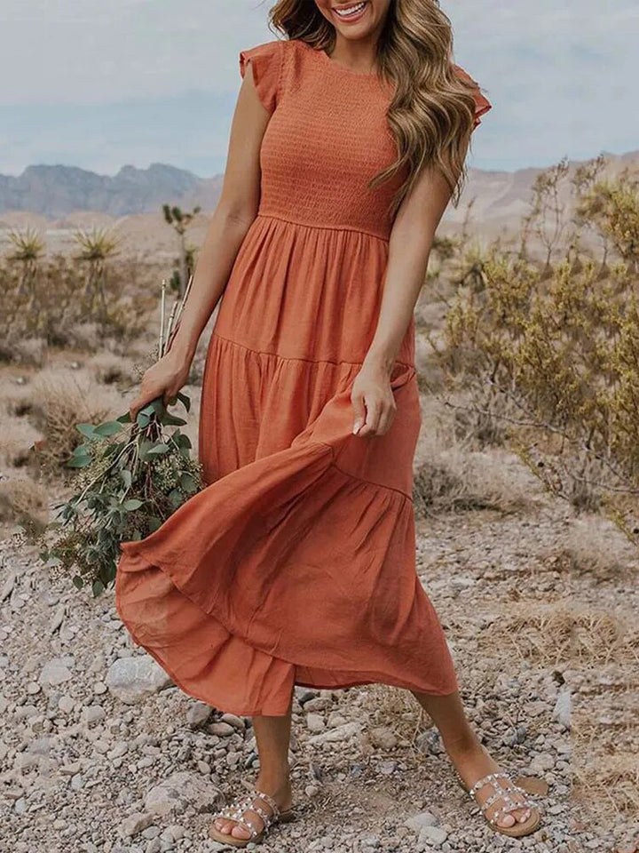 Levoire | Beautiful Sleeveless Pleated Long Dress With Slit And Pockets Orange