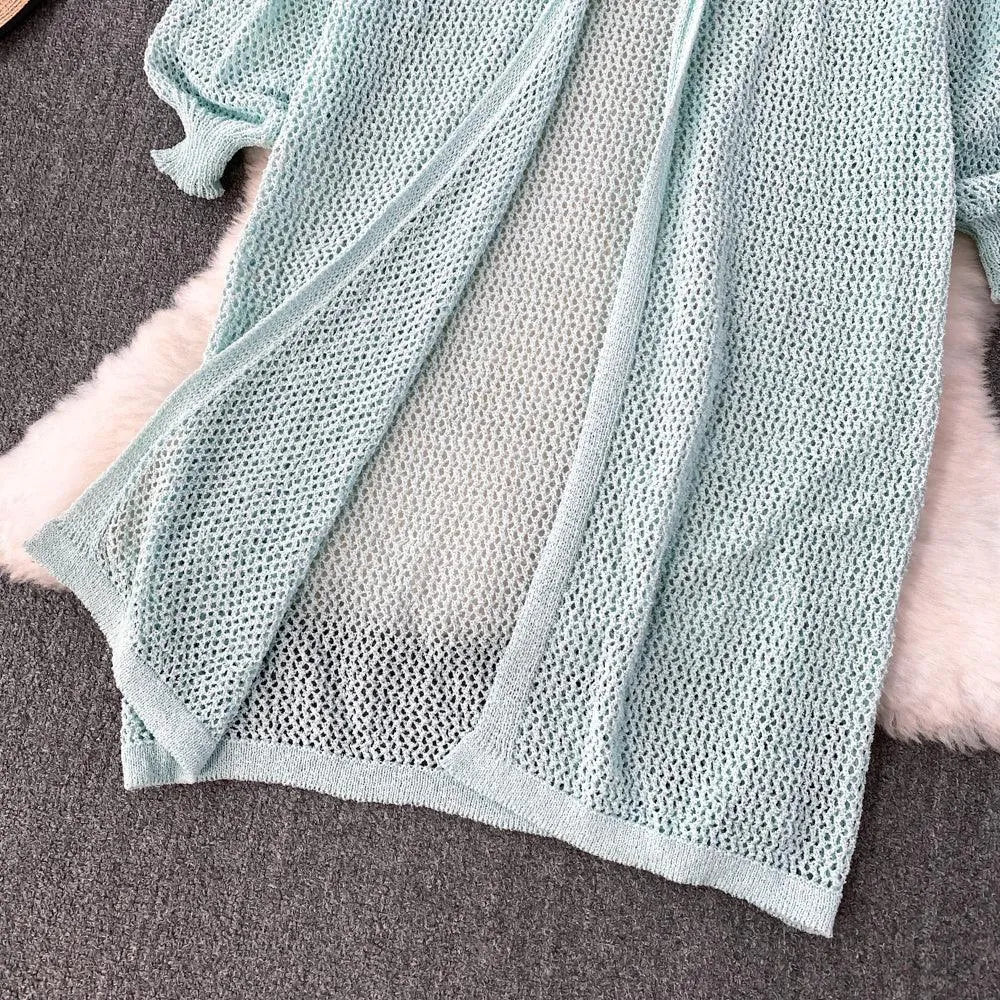 Levoire | Gilet en maille avec des manches bouffantes
