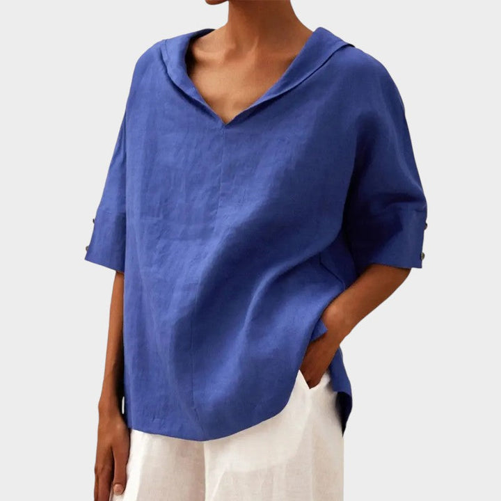 Levoire | Élégante Blouse Avec Des Détails De Bouton Discrets Bleu