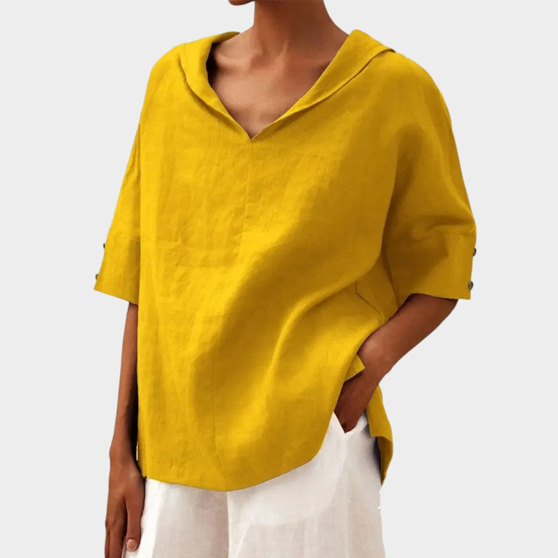 Levoire | Élégante Blouse Avec Des Détails De Bouton Discrets Jaune
