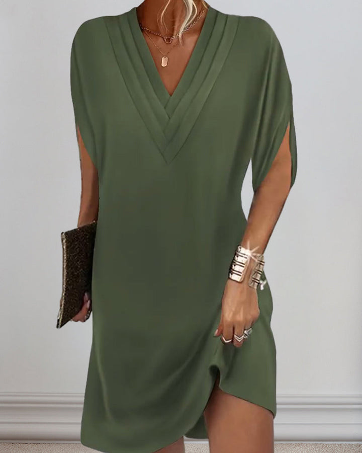 Levoire | Robe Élégante Avec Manches Fendues Dans Une Couleur Unie
