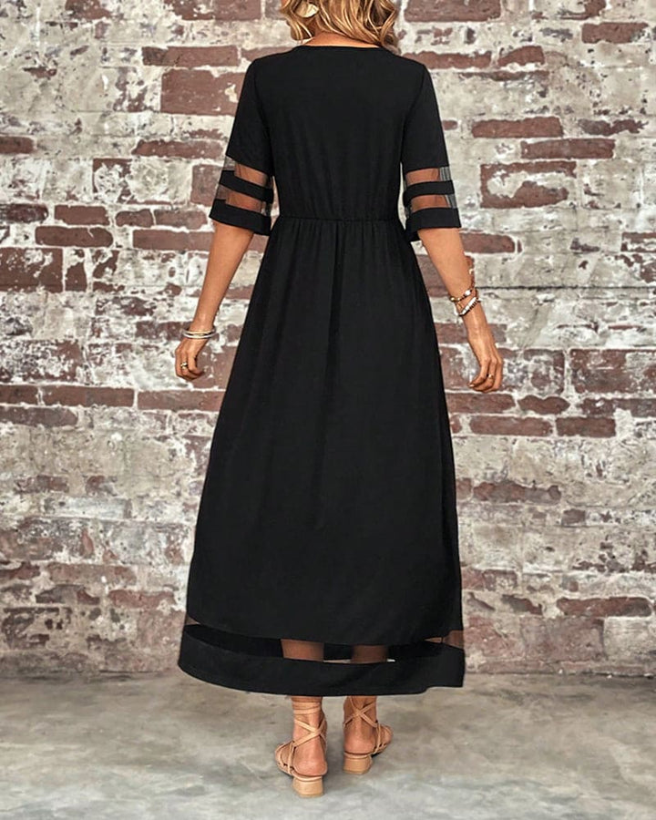Levoire | Robe Élégante À Manches Plus Courtes Et Un Décolleté Rond Décontracté