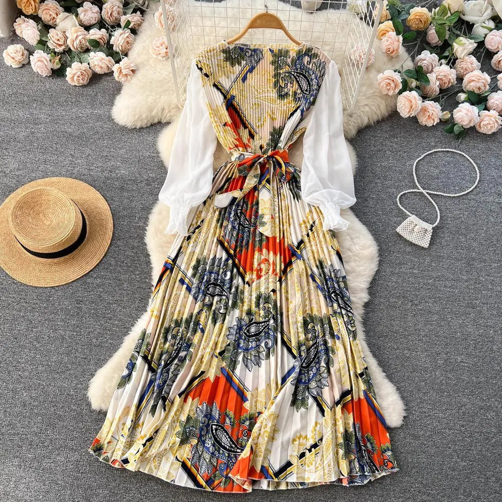 Levoire | Robe avec imprimé ethnique pour femmes, dotée d'un motif floral à nouer Neliö Orange Taille libre