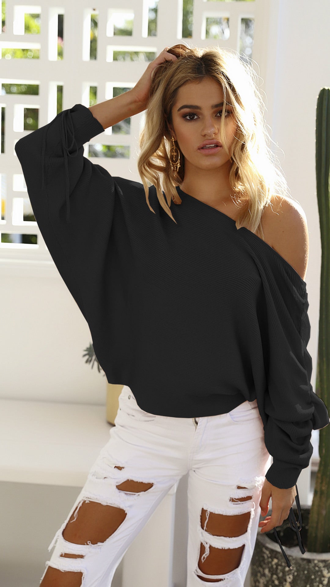 Pull oversized femme à coupe asymétrique Levoire