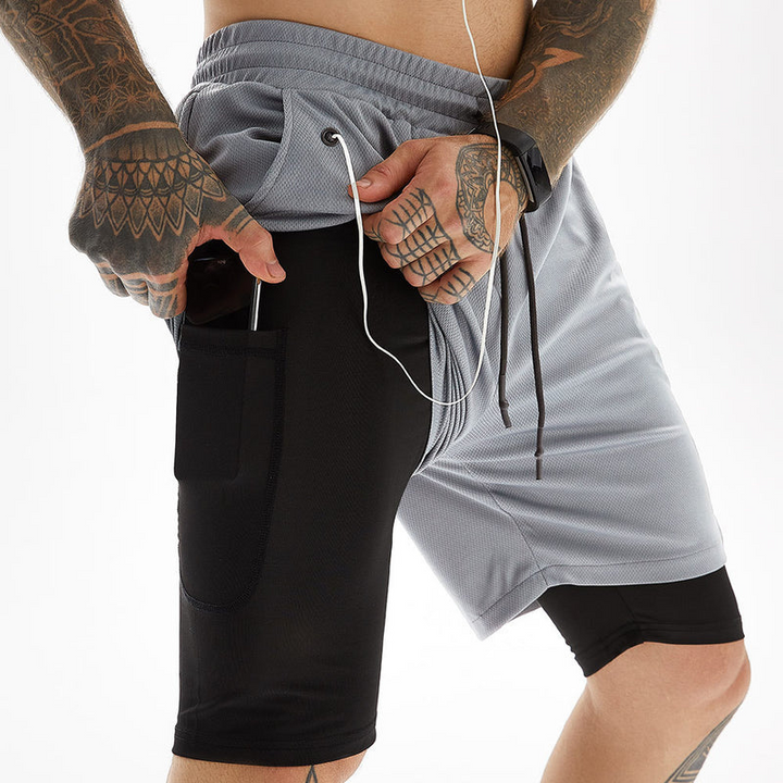 Levoire | Double couche short de course Incl. poche pour téléphone & fente Gris clair
