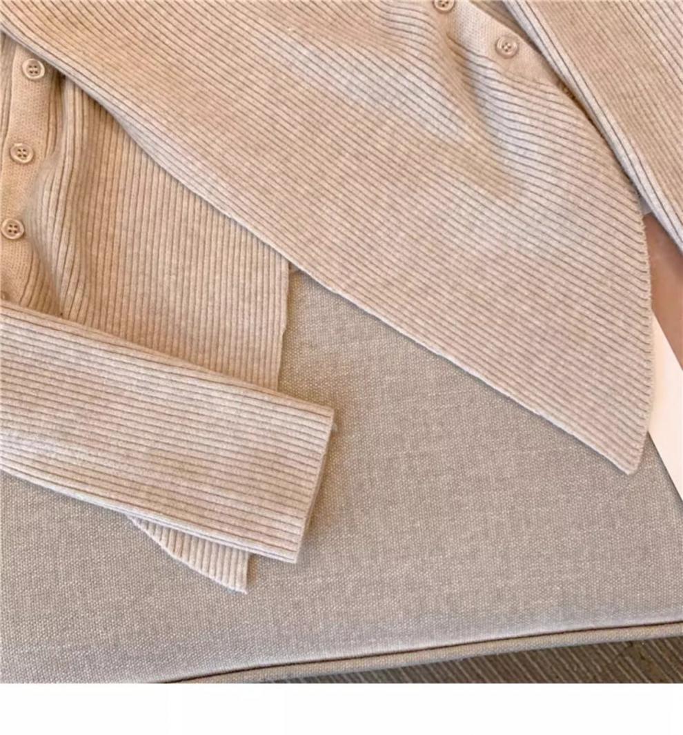 Levoire | Pull asymétrique avec des boutons