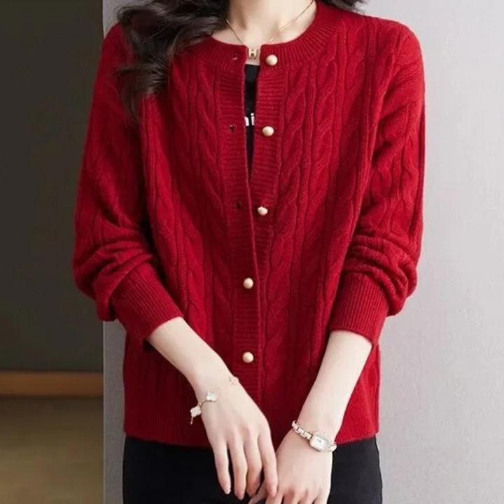 Levoire | Gilet pour femmes avec motif en cable, col rond et boutons dorés Rouge.