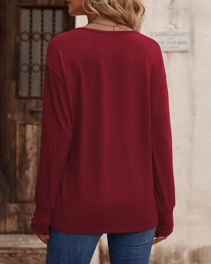 Levoire | Une Blouse À Manches Longues Et Un Col En V