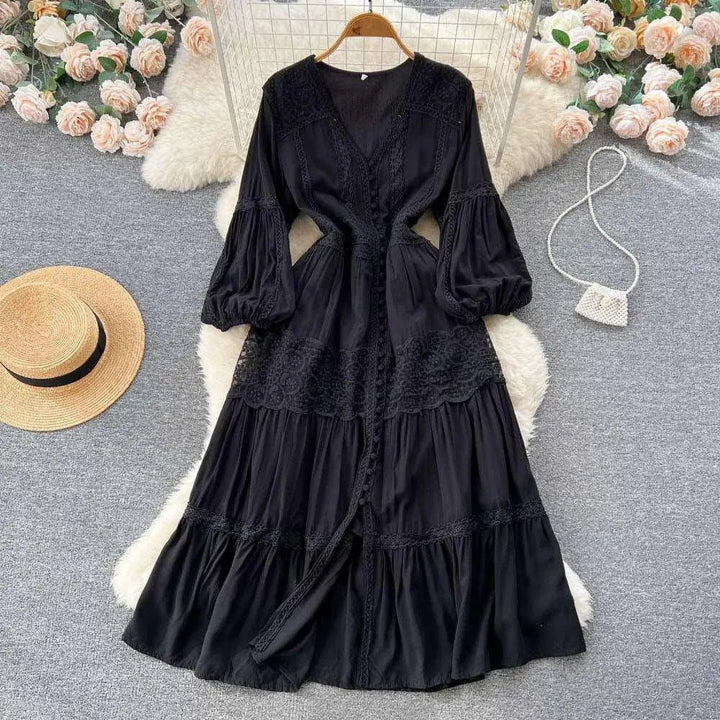 Levoire | Robe avec manches bouffantes et taille délicate Noir