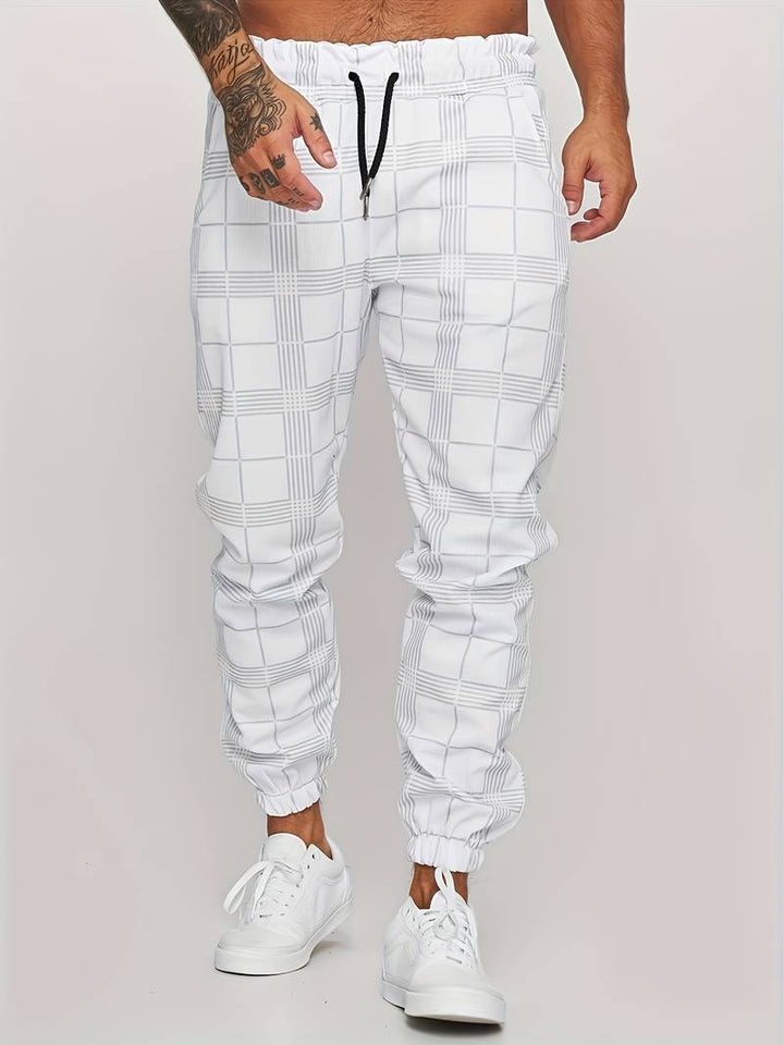 Levoire | Pantalon de course à slim fit à pois pour hommes Blanc