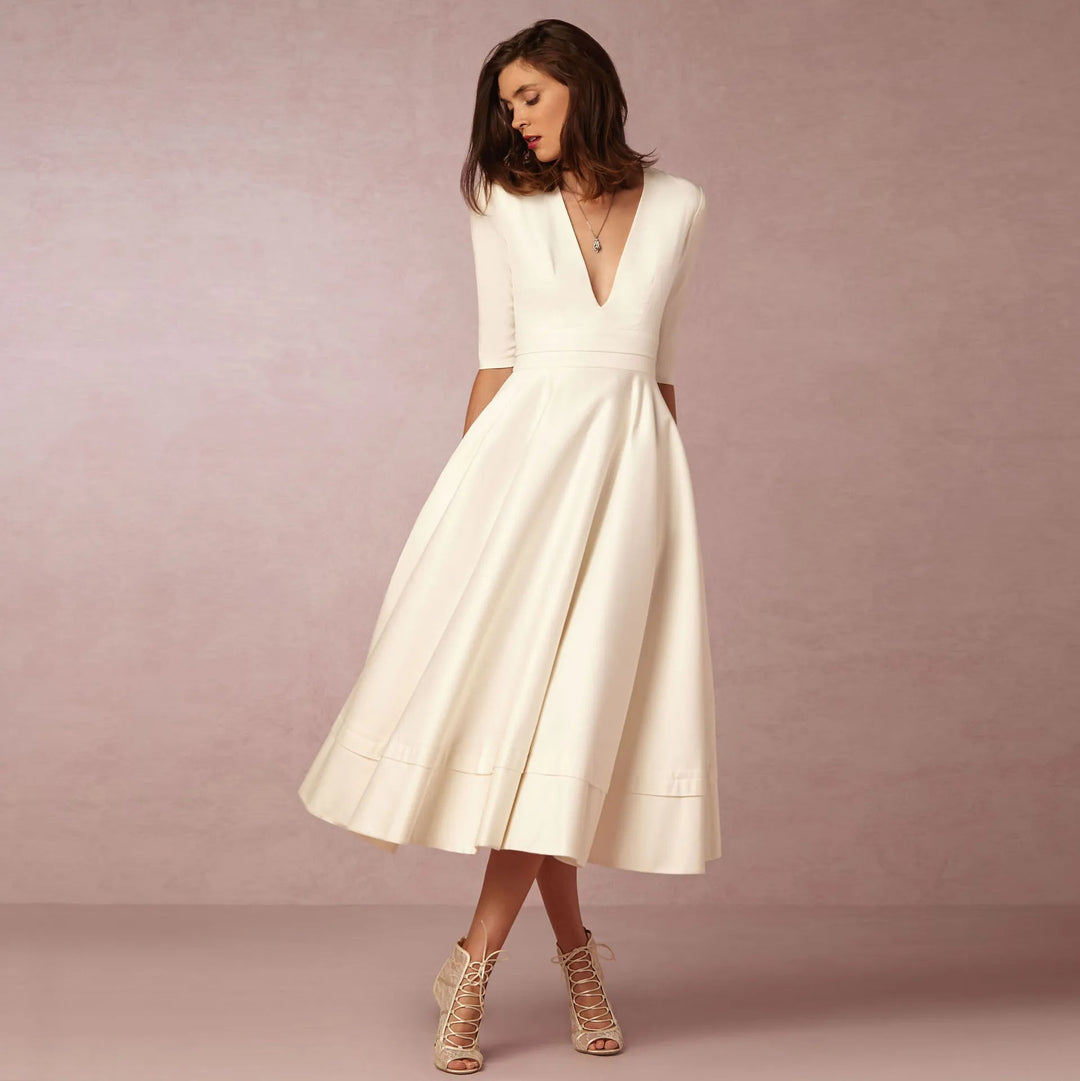 Levoire | Robe élégante en A avec décolleté en V profond Blanc