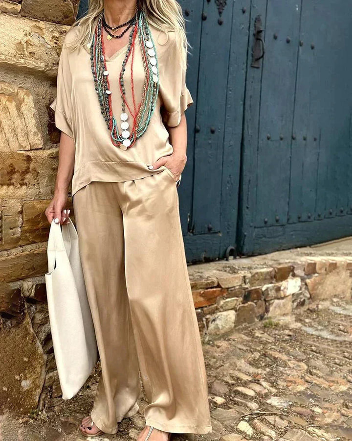 Levoire | Élégant Haut Blanc Avec Encolure En V Et Pantalon À Jambe Large