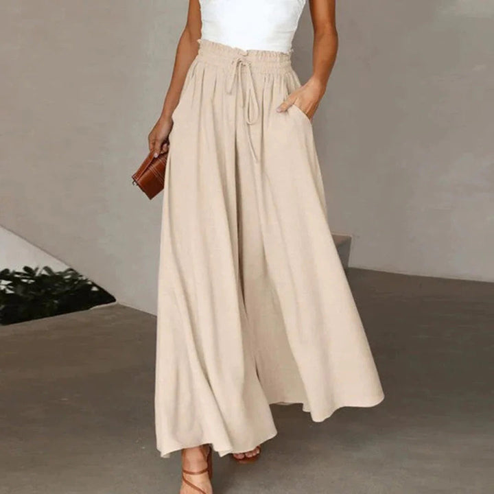 Levoire | Pantalon Fluide Avec Flair Élégant Beige