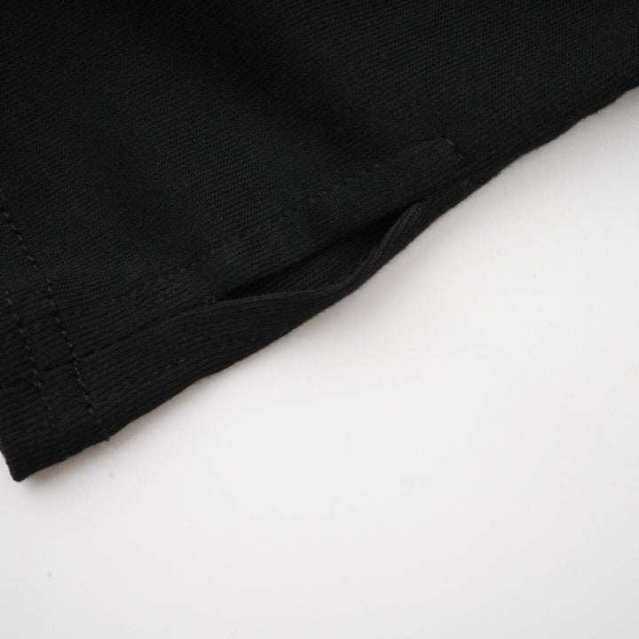 Levoire | Chemisier Noir À Volants En Jersey Extensible