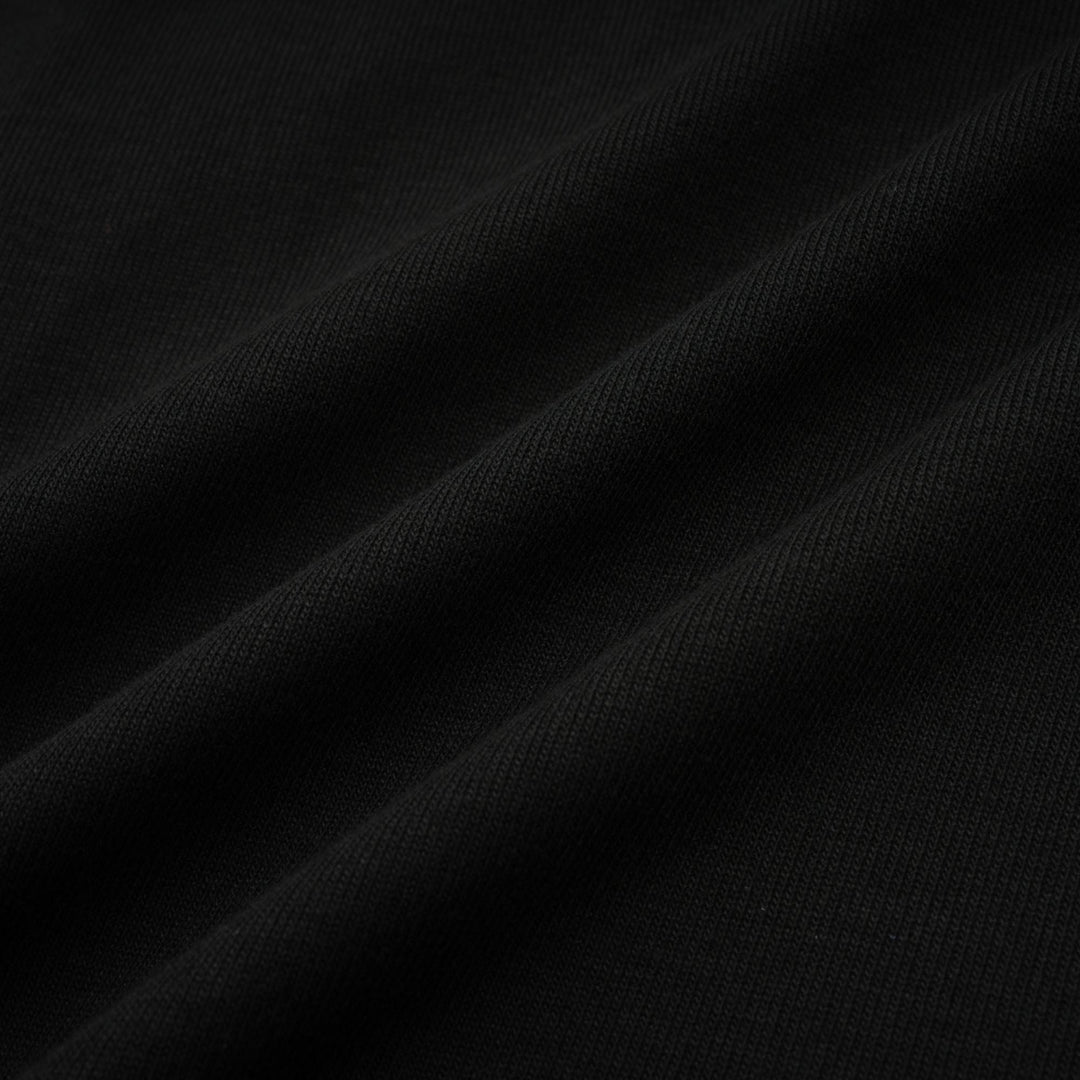 Levoire | Chemisier Noir À Volants En Jersey Extensible