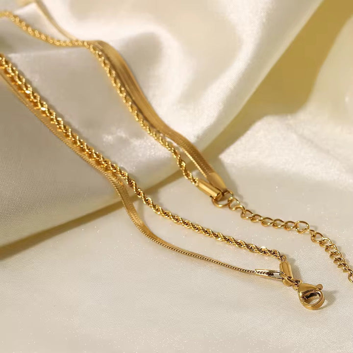 Levoire | Collier Doré À Double Rangée Composé De Chaîne En Maillons Et De Chaîne Serpent