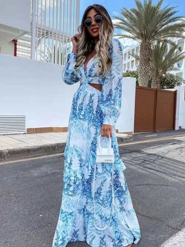 Levoire | Robe élégante à manches longues et décolleté en V imprimé