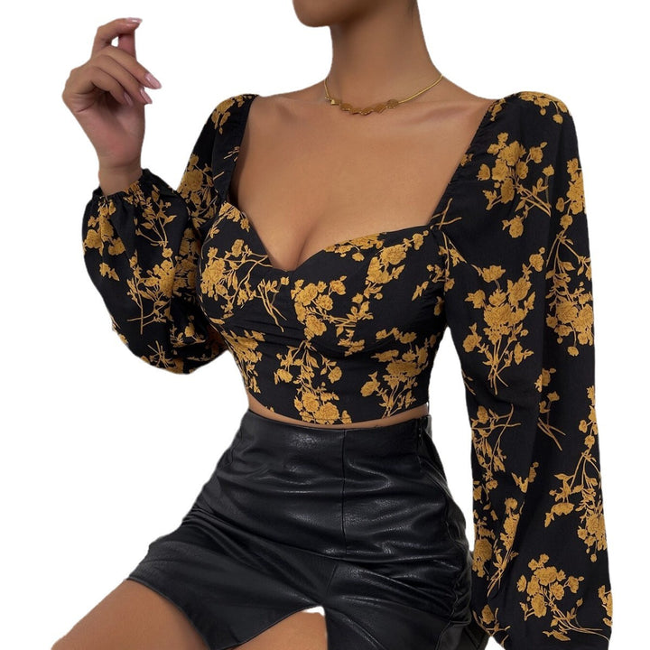 Top court féminin avec motif floral et élégante manches bouffantes Levoire