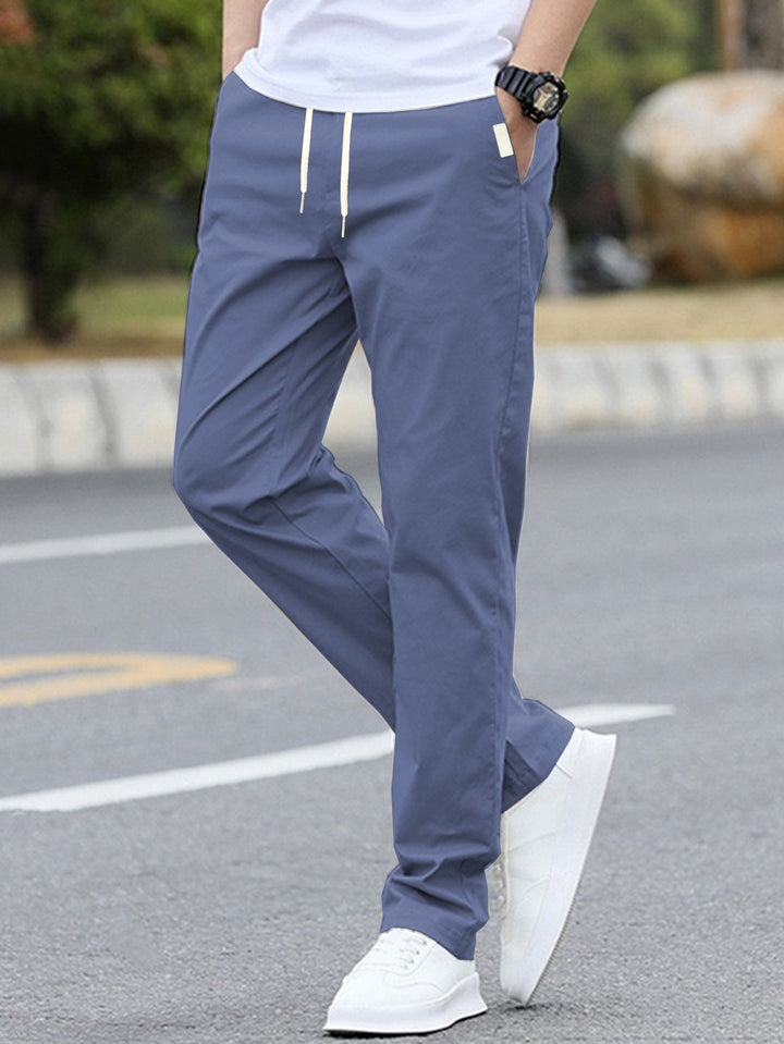 Pantalons de loisirs sportifs pour hommes avec taille élastique et poches latérales modernes Avriane