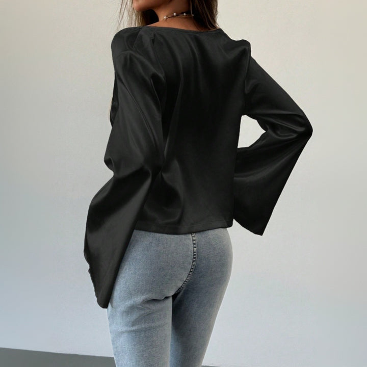 Blouse élégante femme avec décolleté en V profond et détail de nœud décontracté Levoire