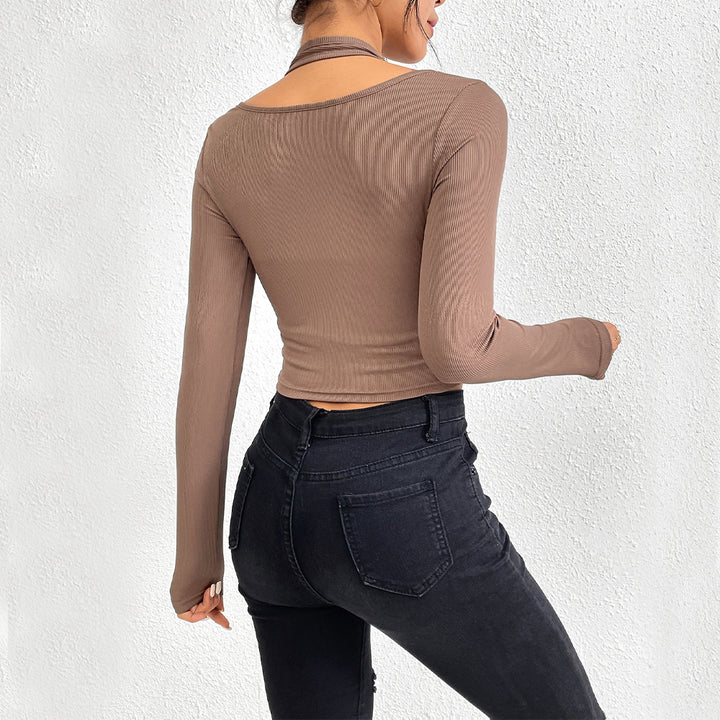 Chemise pour femmes à manches longues coupée avec design élégant en torsion et accents de couleur Levoire