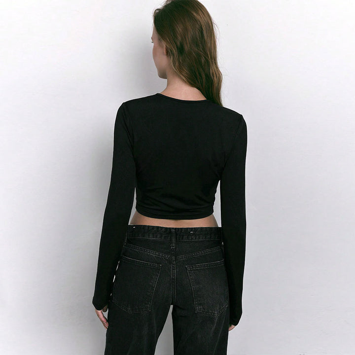 Chemise femme à manches longues cropped avec des découpes tendance et des détails de bague décoratifs Levoire