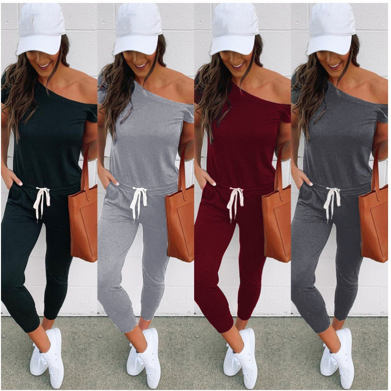 Combinaison élégante pour femmes avec décolleté asymétrique et accentuation de la taille haute Levoire