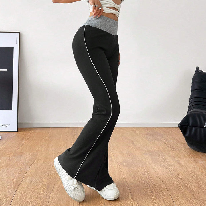 Pantalon évasé sportif pour femmes avec taille haute et inserts latéraux contrastés Levoire