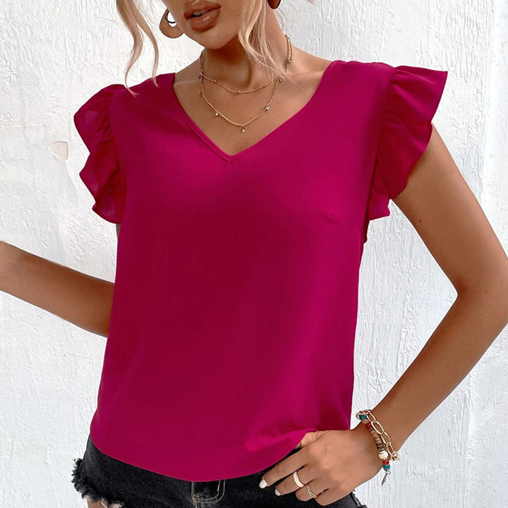 Blouse pour femmes avec des détails de volants volumineux et un élégant col en V Levoire