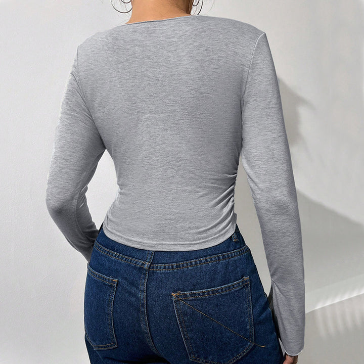 Chemise femme courte à manches longues avec des manches en trompette à la mode et un élégant col en V Levoire