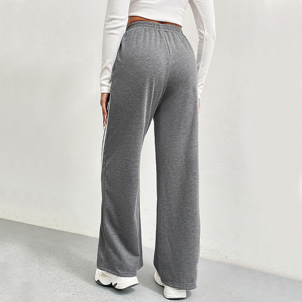 Pantalons de loisirs sportifs pour femmes avec coupe large et rayures contrastées Levoire