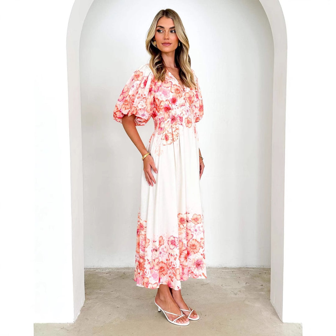 Robe maxi pour femmes avec manches bouffantes volumineuses et design floral Levoire