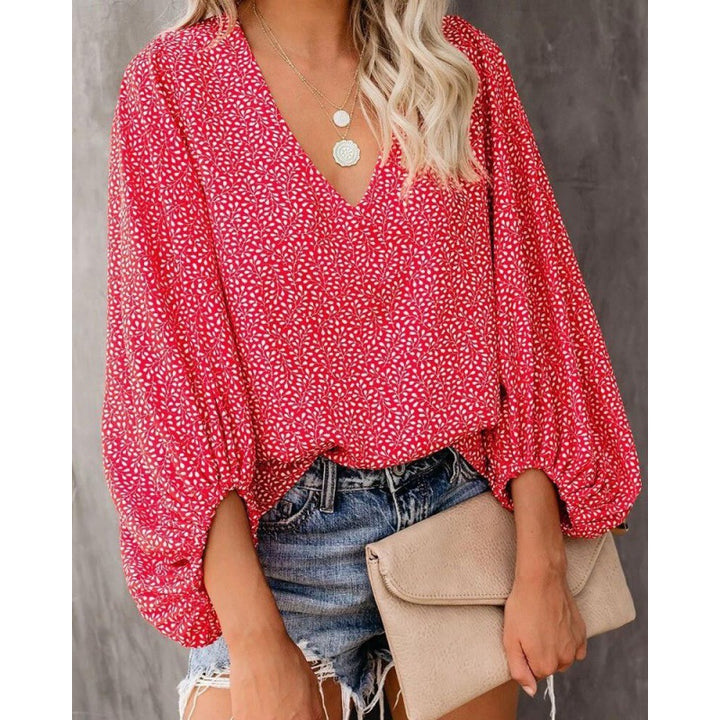Blouse féminine à la mode avec des manches larges et un col en V Levoire
