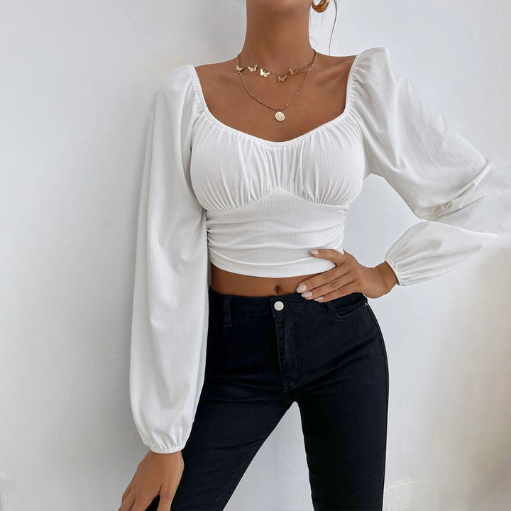 Top court pour femmes avec un design de manches bouffantes élégant et une silhouette ajustée Levoire