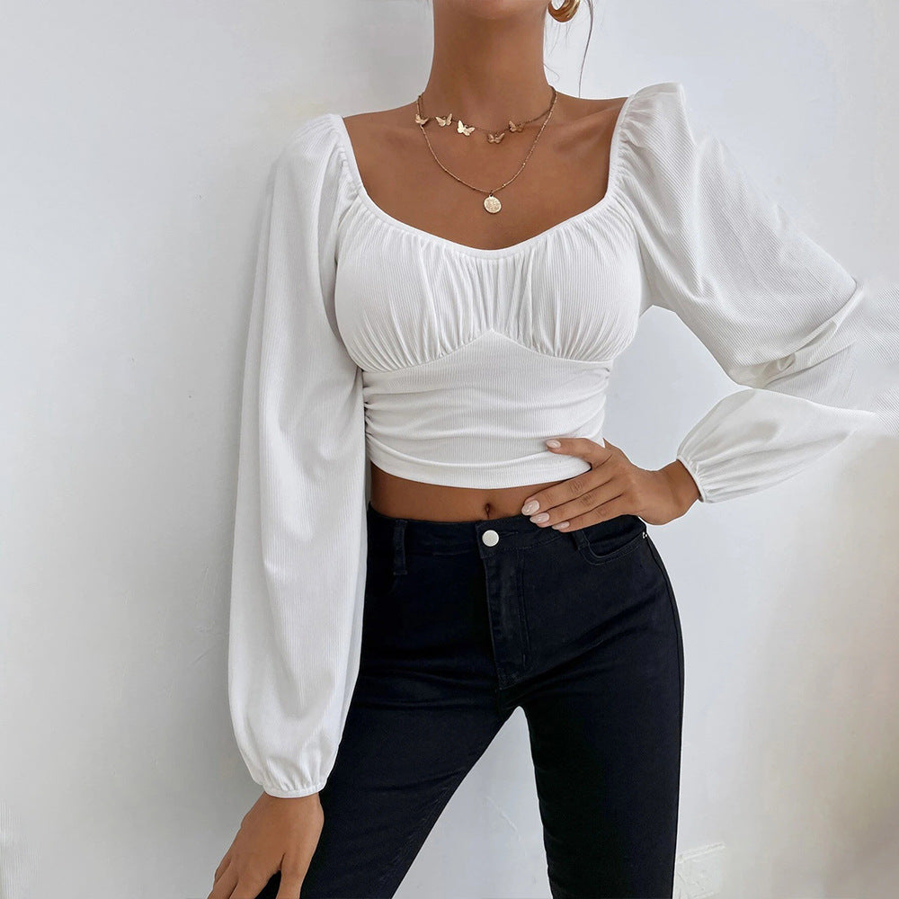 Haut court pour femmes avec un design de manches bouffantes élégant et une coupe ajustée Levoire