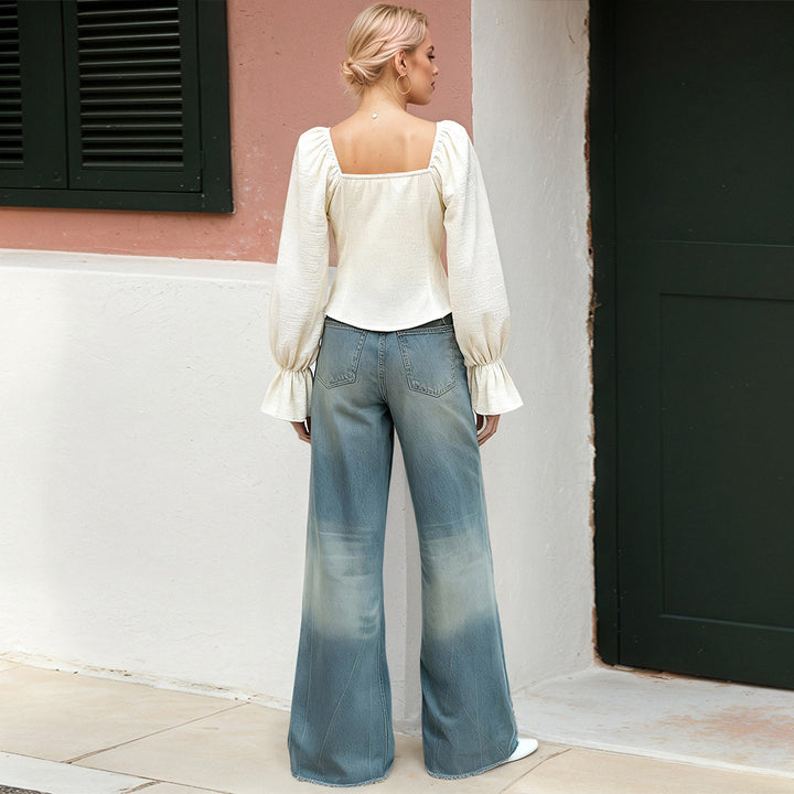 Blouse pour femmes avec des manches volantes extravagantes et une silhouette ajustée Levoire