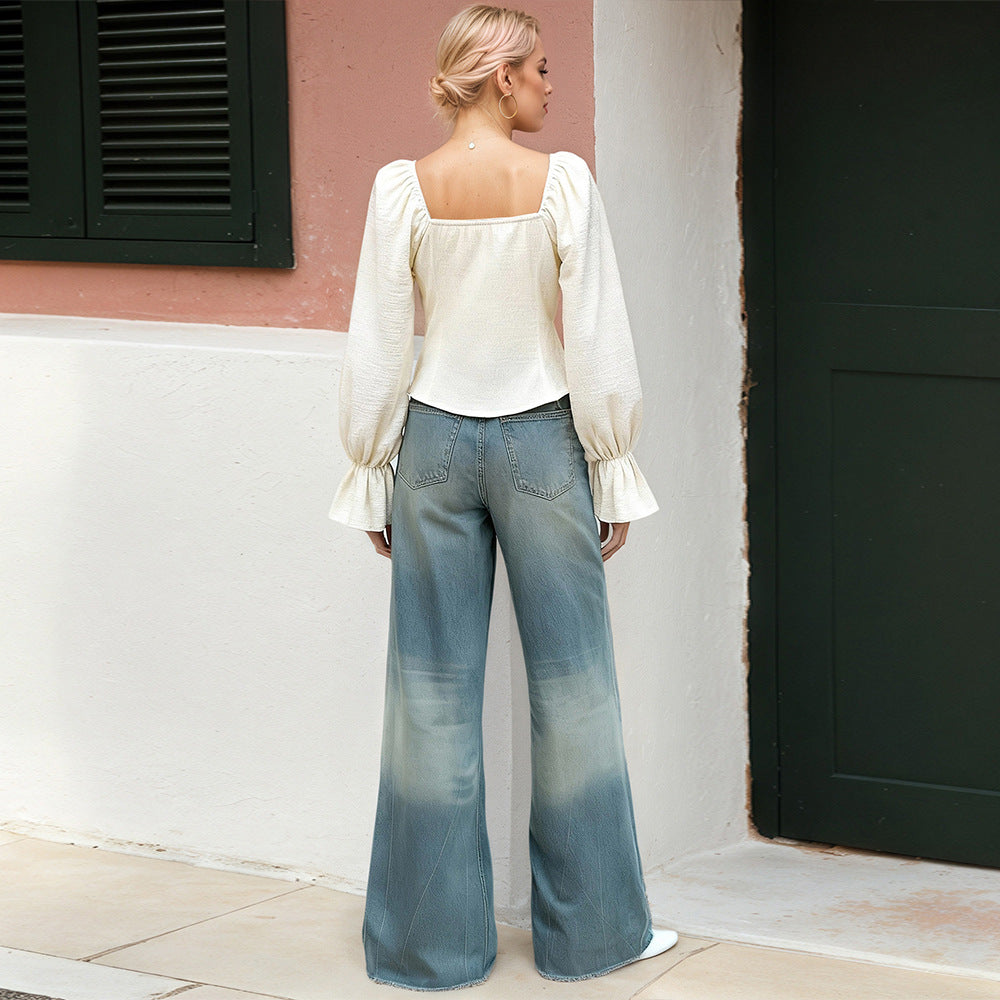 Blouse pour femme avec des manches à volants inhabituelles et une silhouette ajustée Levoire