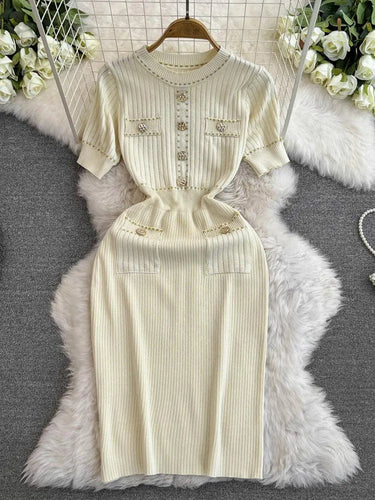 Levoire | Robe à longueur genou ajustée à la taille haute