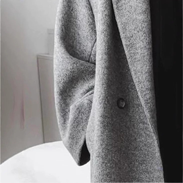 Manteau en laine oversize pour femmes avec patte de boutonnage double et coupe élégante Levoire