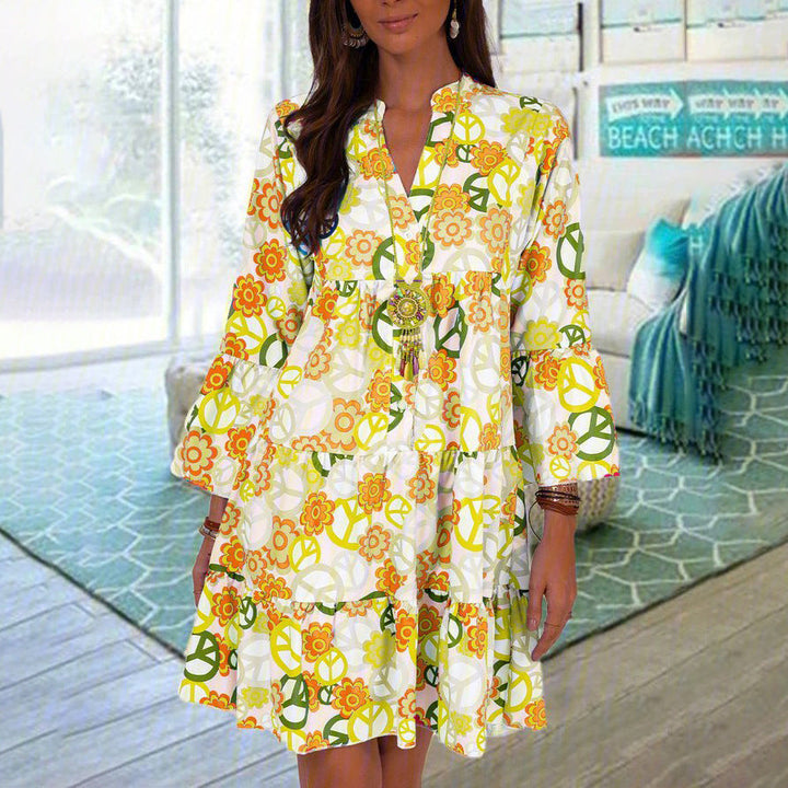 Levoire | Robe à fleurs élégante avec col montant et trois-quarts de manches Jaune