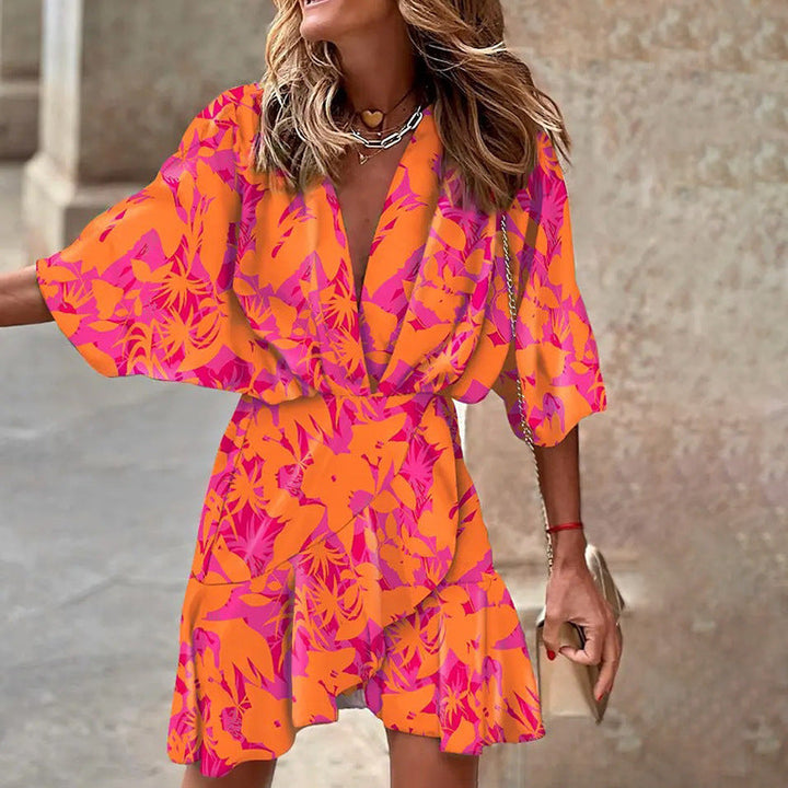 Levoire | Robe Élégante Avec Des Manches Chauve-Souris Orange