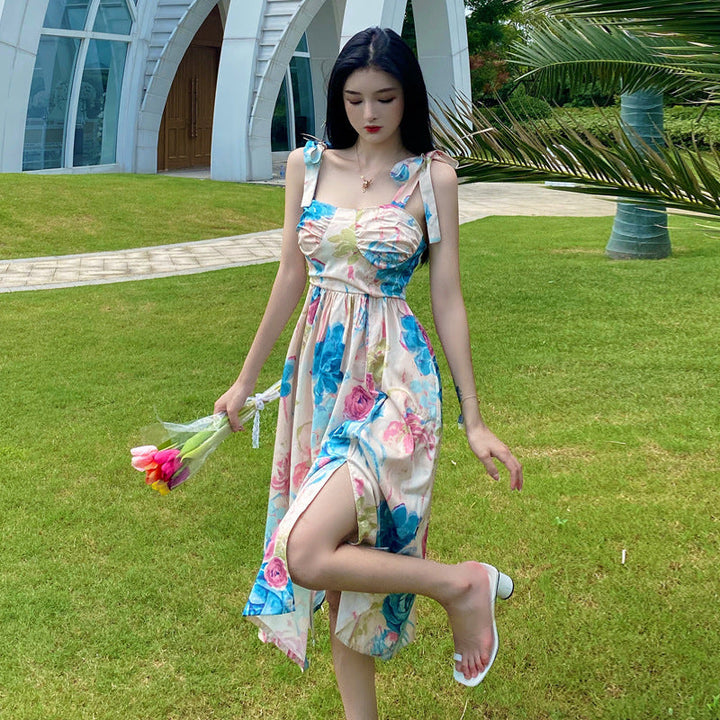 Levoire | Robe à fleurs Retro robe à taille cintrée à motif floral