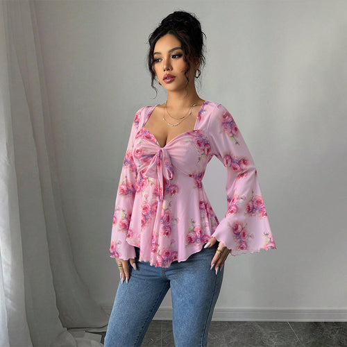 Blouse fluide pour femmes avec motif floral et nœud ludique Levoire