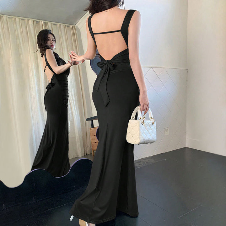Robe de soirée élégante pour femmes avec découpes arrière raffinées et ceinture décorative à nouer Levoire