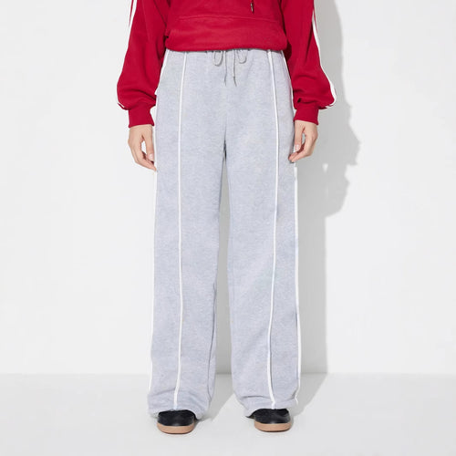 Pantalons d'entraînement décontractés pour femmes dans une coupe moderne avec une taille élastique et des inserts latéraux stylés Levoire